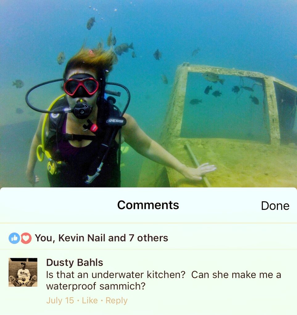 Woman Scuba Diving with Comment